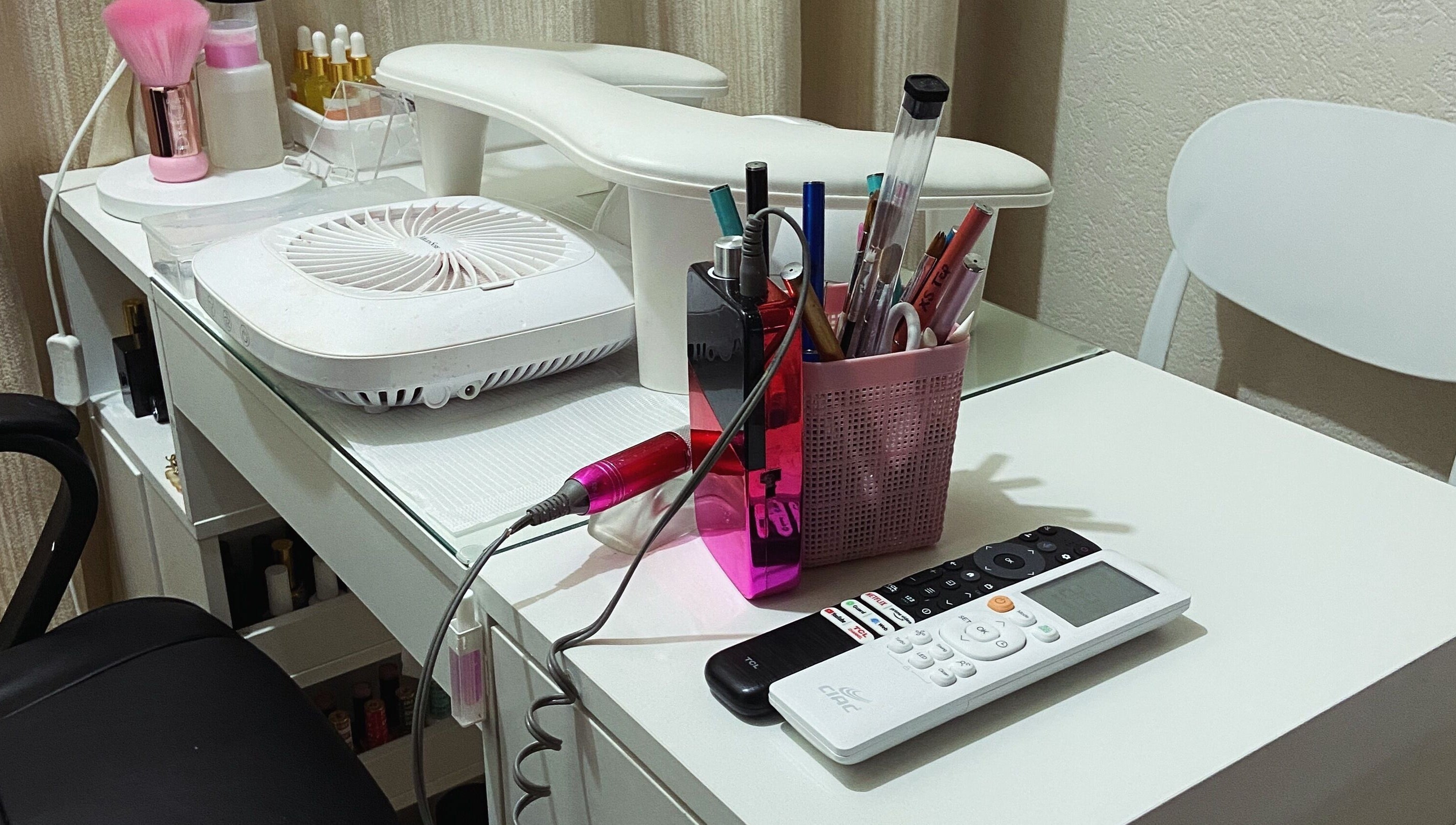 Nail station setup at For Love & Lemons | The Nail Studio, Saint Philip, BB featuring tools and equipment.