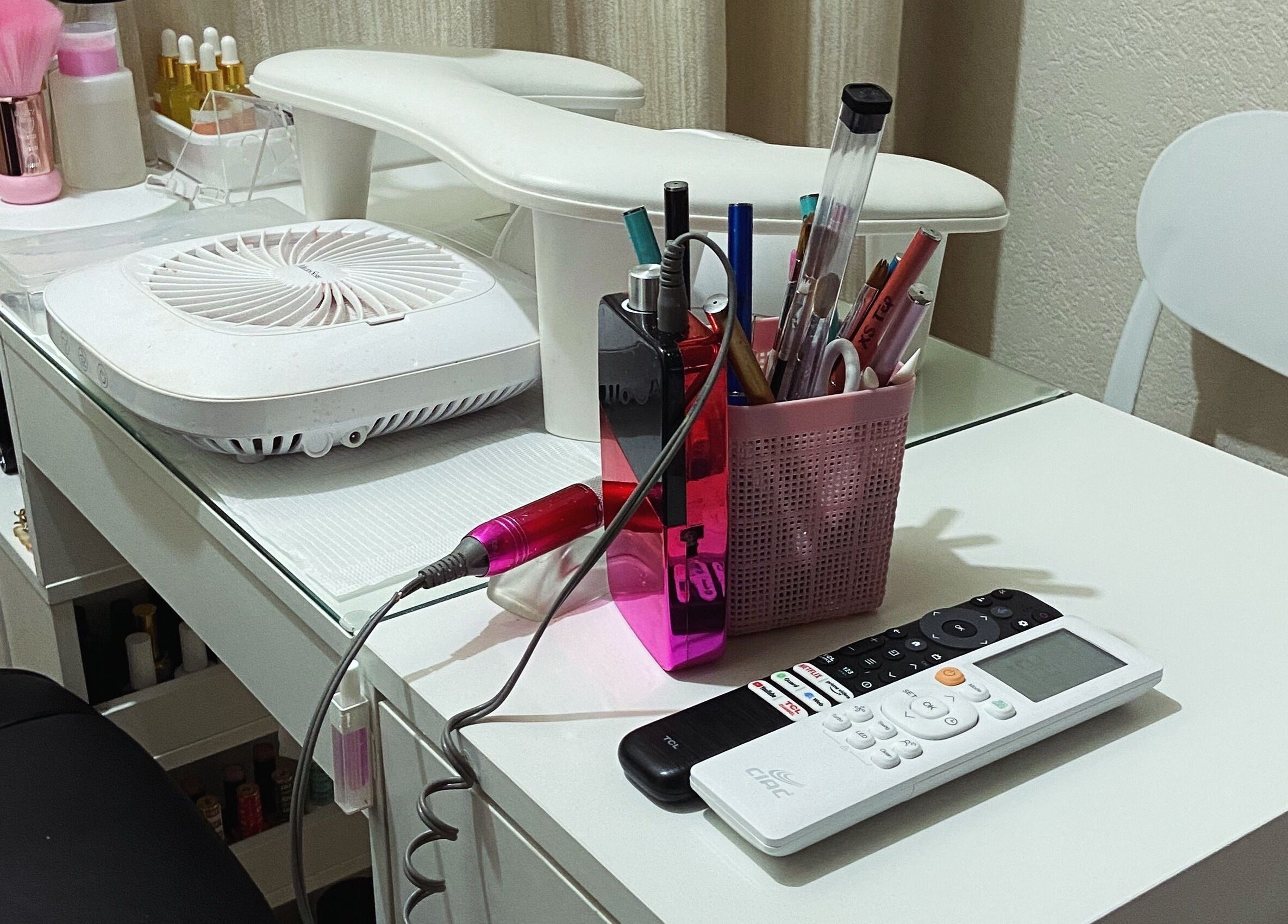 Nail station setup at For Love & Lemons | The Nail Studio, Saint Philip, BB featuring tools and equipment.