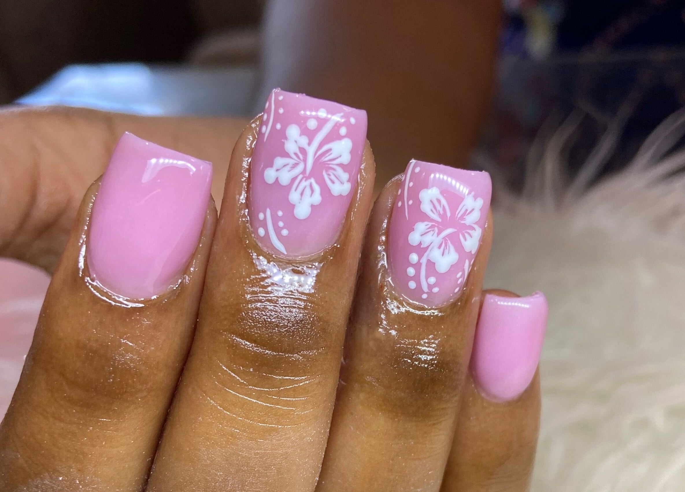 Elegant pink nails with floral design at For Love & Lemons | The Nail Studio, Saint Philip, BB.