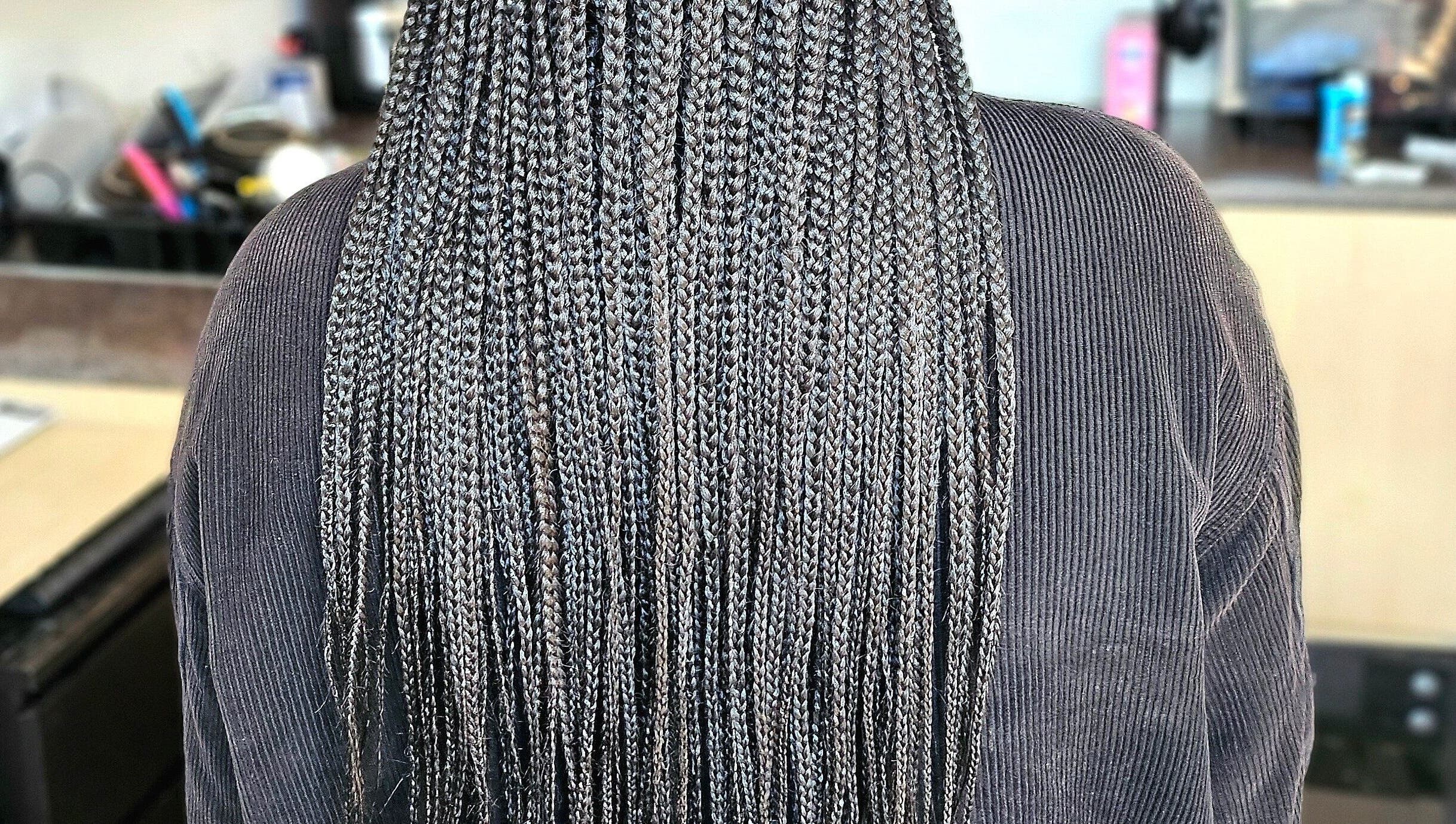 Intricate braids showcased at Jay's Braid Studio, renowned beauty salon in Bristol, England, GB.