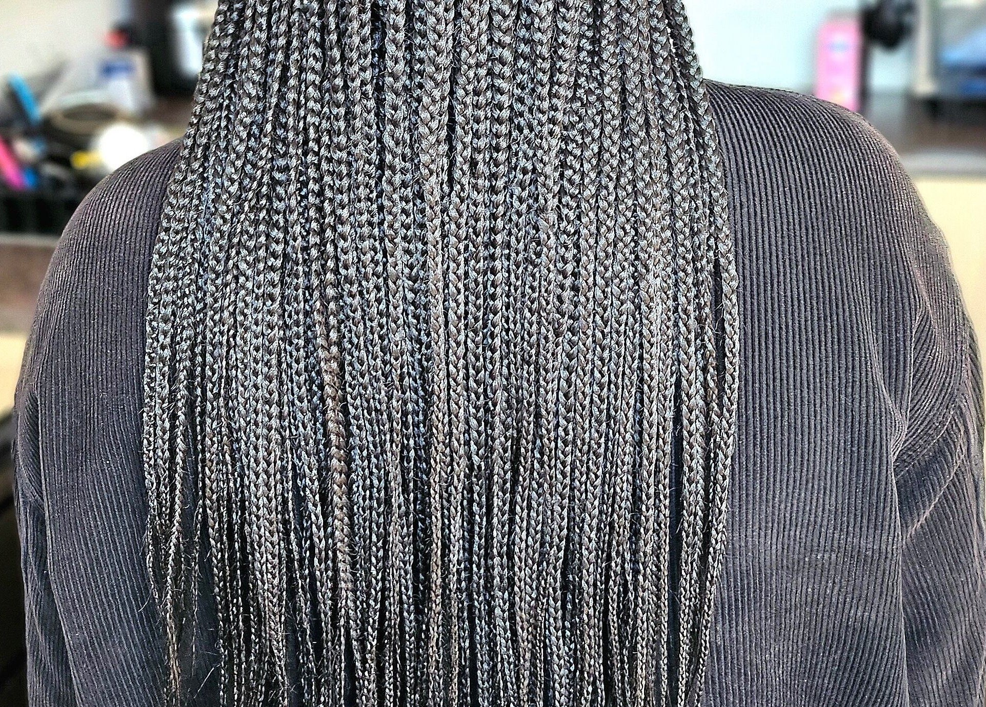 Intricate braids showcased at Jay's Braid Studio, renowned beauty salon in Bristol, England, GB.