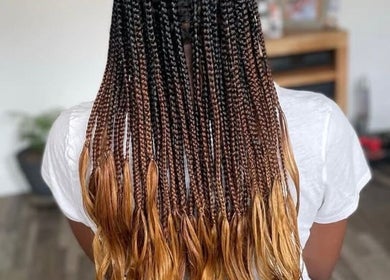 Intricate golden ombre braids at Jay's Braid Studio, Bristol, England, GB. Stunning hair artistry and style.