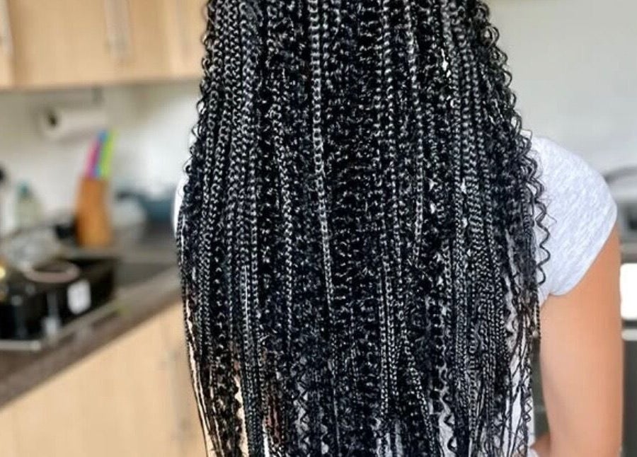 Intricate, long braid style at Jay's Braid Studio, Bristol, England, GB. Showcasing expert hair artistry.