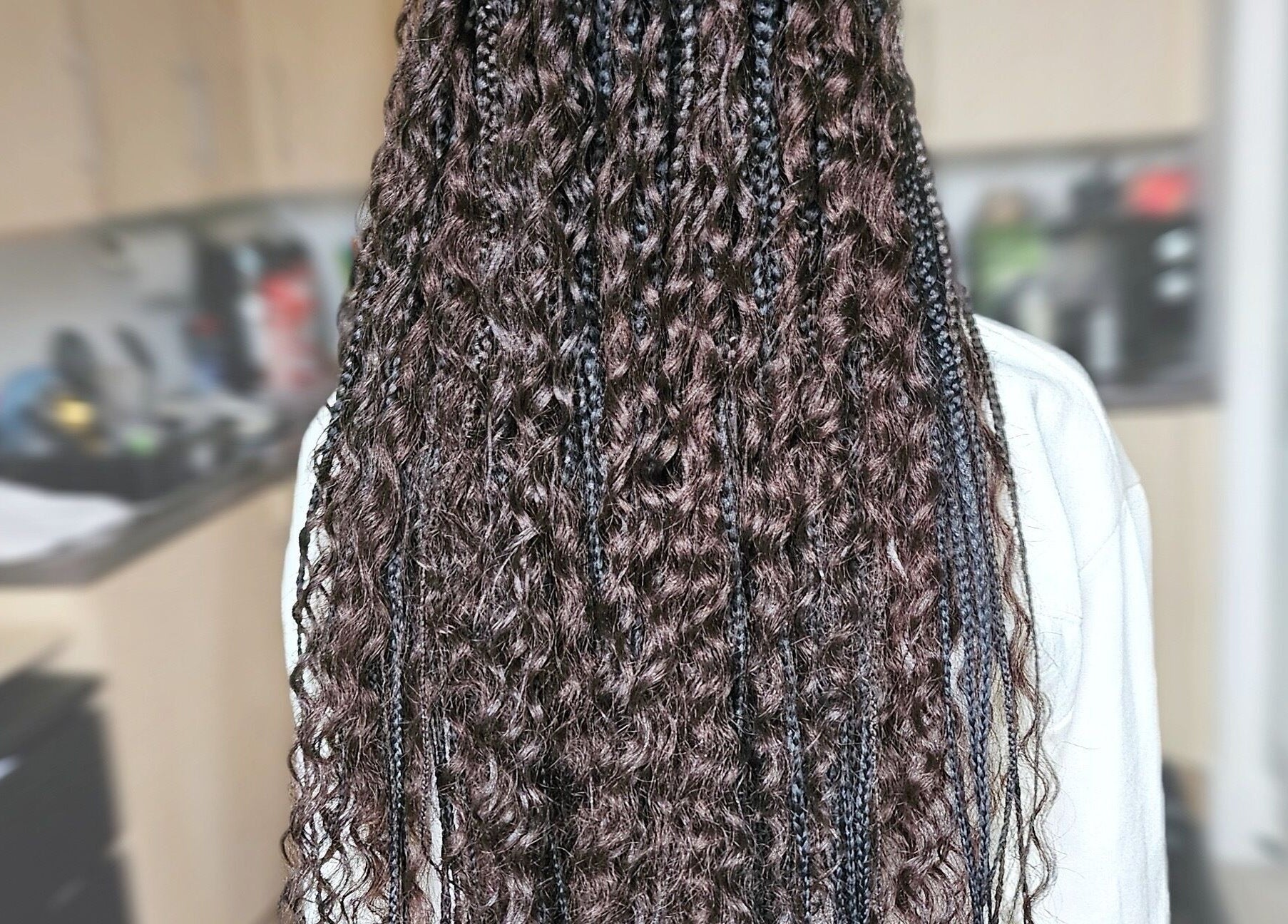 Intricate braids at Jay's Braid Studio in Bristol, England, GB showcase expert styling.