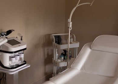 Modern treatment room at Arina Ry Beauty, Northampton, England, GB, showcasing skincare equipment.
