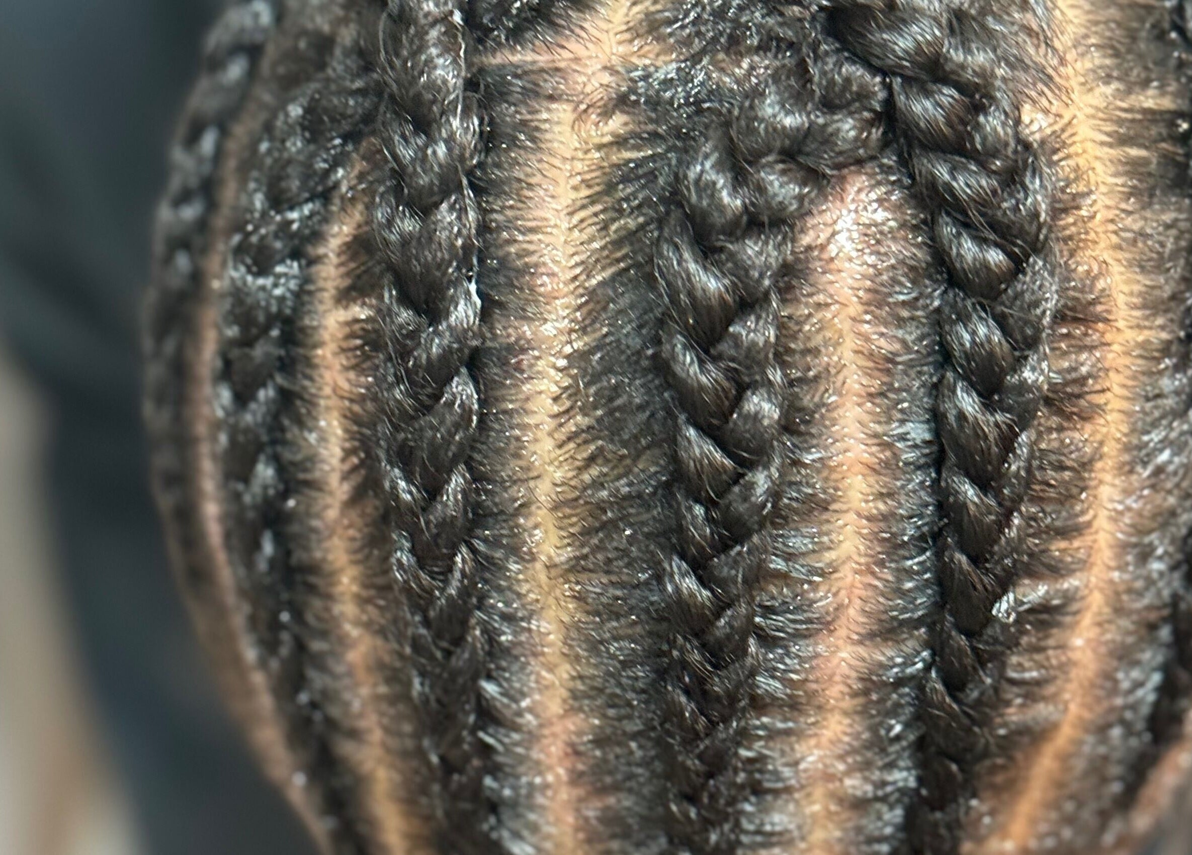 Close-up of intricate braids at Jazz at Blue Hair Vibes Studio, Temecula, California, US.