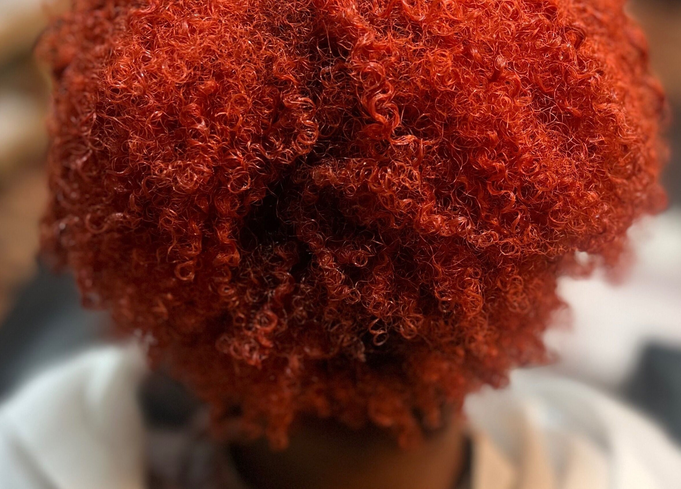 Vibrant red curls styled at Jazz at Blue Hair Vibes Studio, Temecula, California, US.