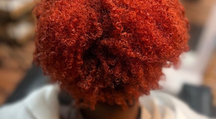 Vibrant red curls styled at Jazz at Blue Hair Vibes Studio, Temecula, California, US.