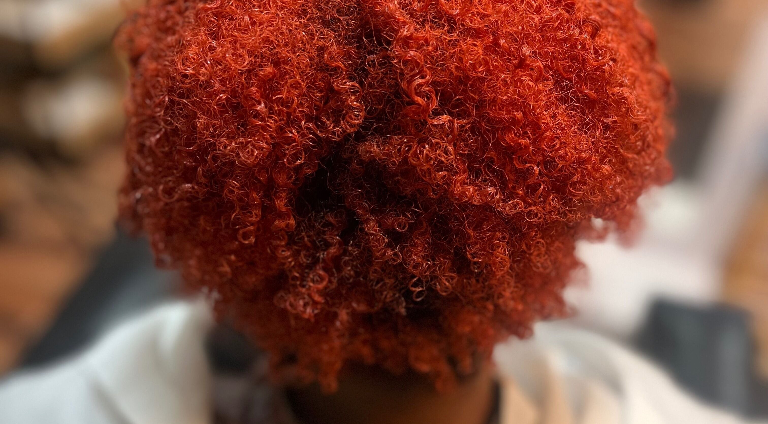Vibrant red curls styled at Jazz at Blue Hair Vibes Studio, Temecula, California, US.