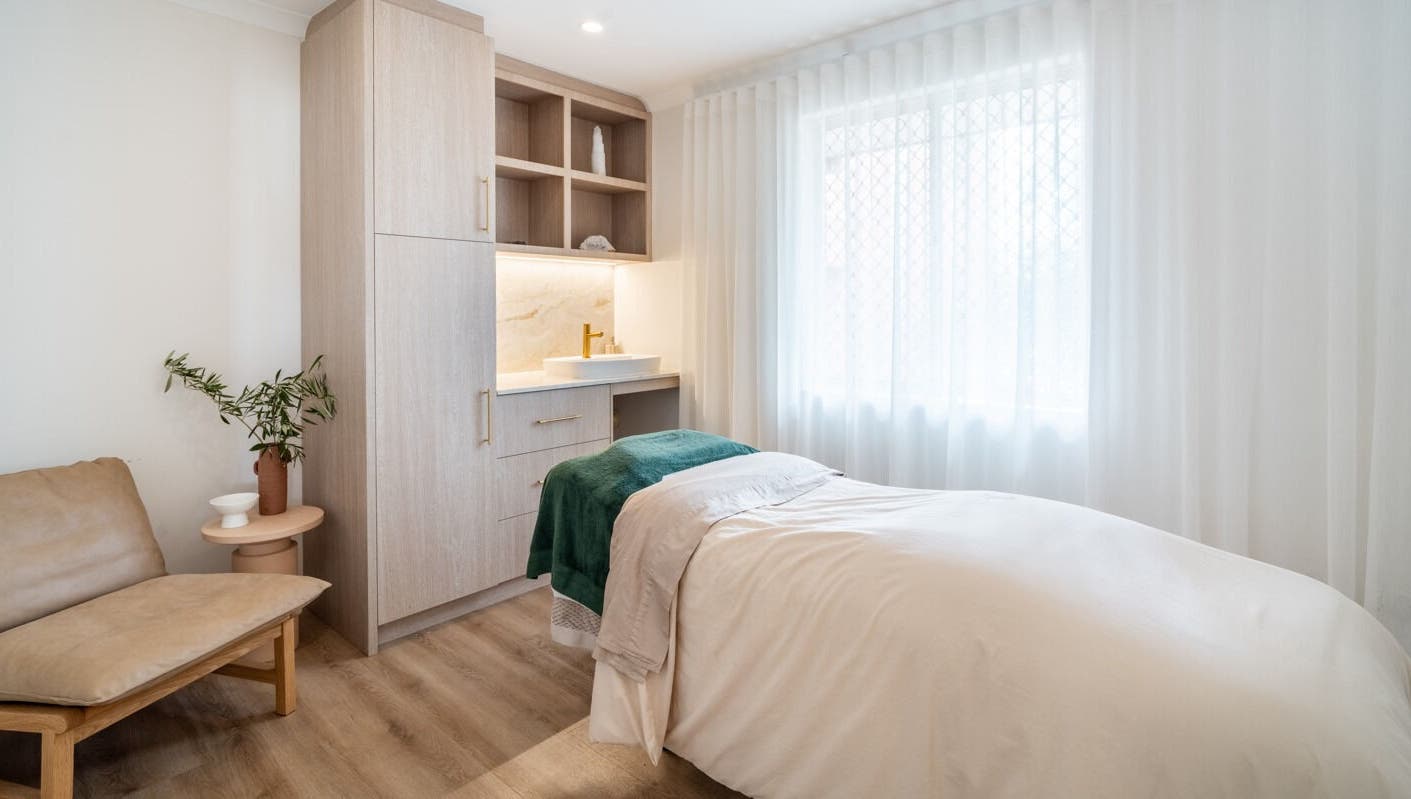 Inviting treatment room at Surskin, Perth, Western Australia, AU, featuring a soft bed and soothing decor.