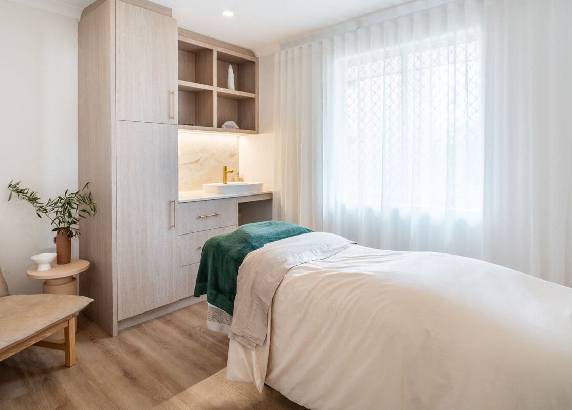 Inviting treatment room at Surskin, Perth, Western Australia, AU, featuring a soft bed and soothing decor.