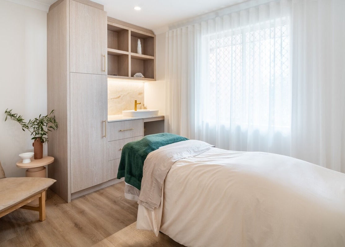 Inviting treatment room at Surskin, Perth, Western Australia, AU, featuring a soft bed and soothing decor.