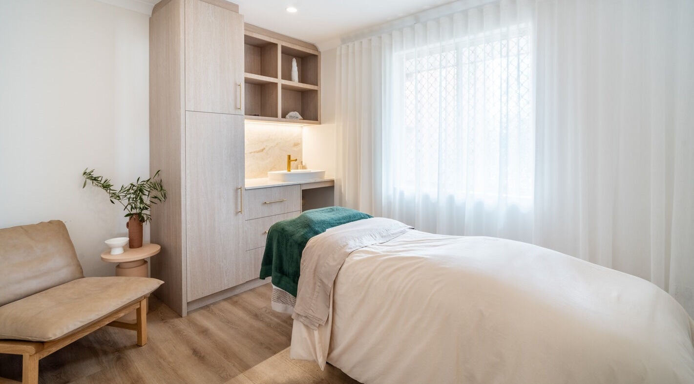 Inviting treatment room at Surskin, Perth, Western Australia, AU, featuring a soft bed and soothing decor.