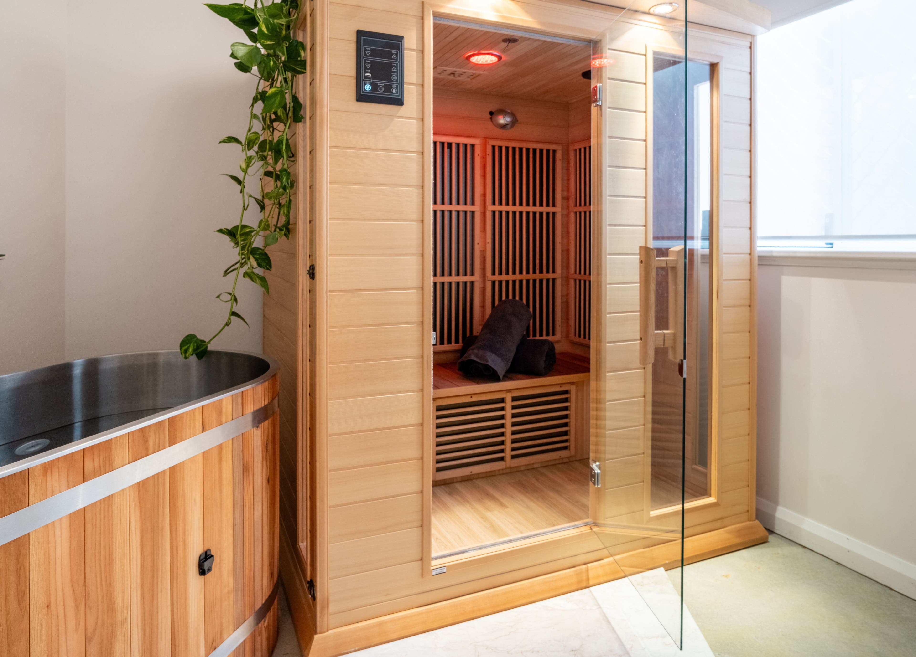 Relaxing sauna and tub at Surskin, Perth, Western Australia, AU, offering a peaceful wellness experience.