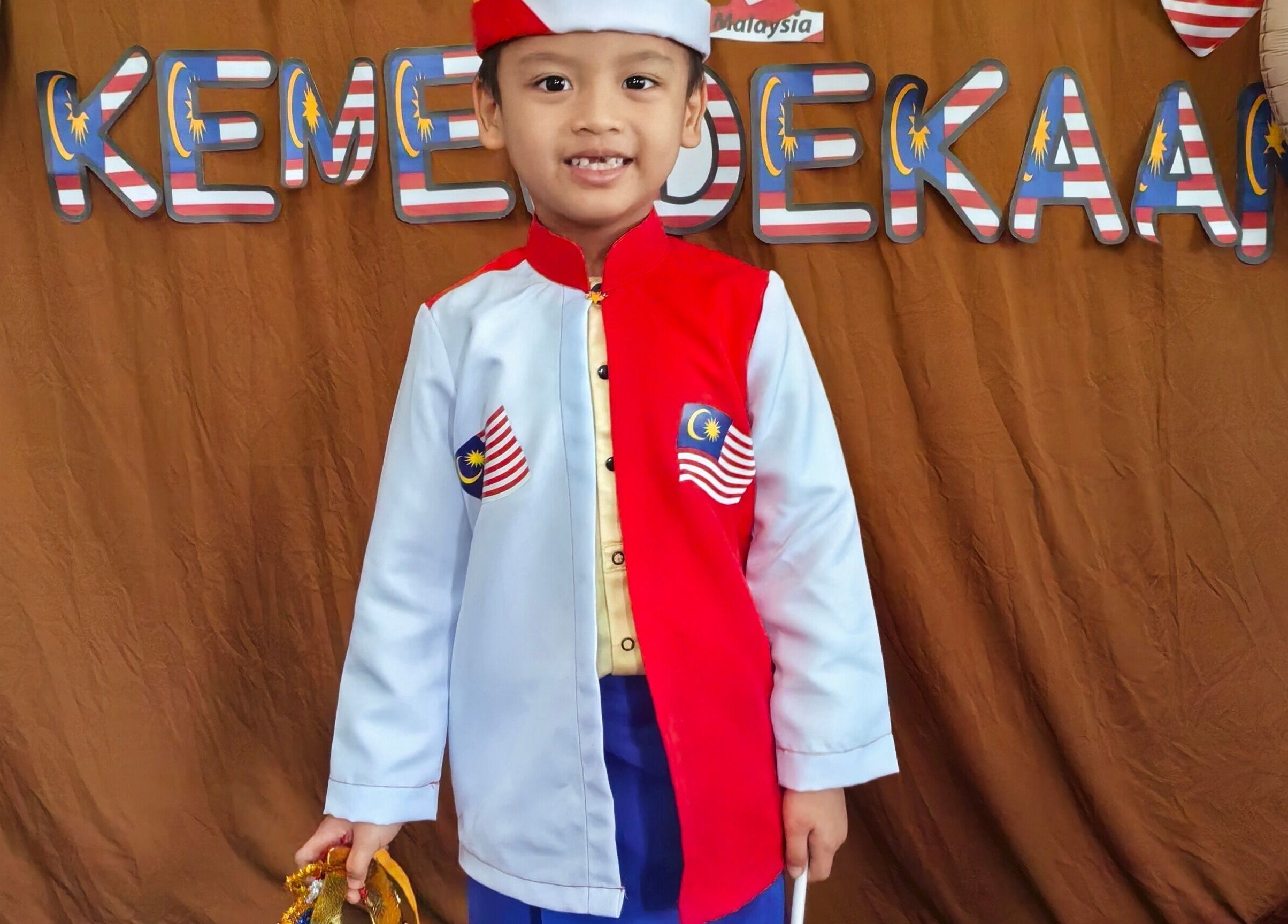 Child in traditional attire at Heartfitted Sewing and Alterations, Kuching, Sarawak, MY.