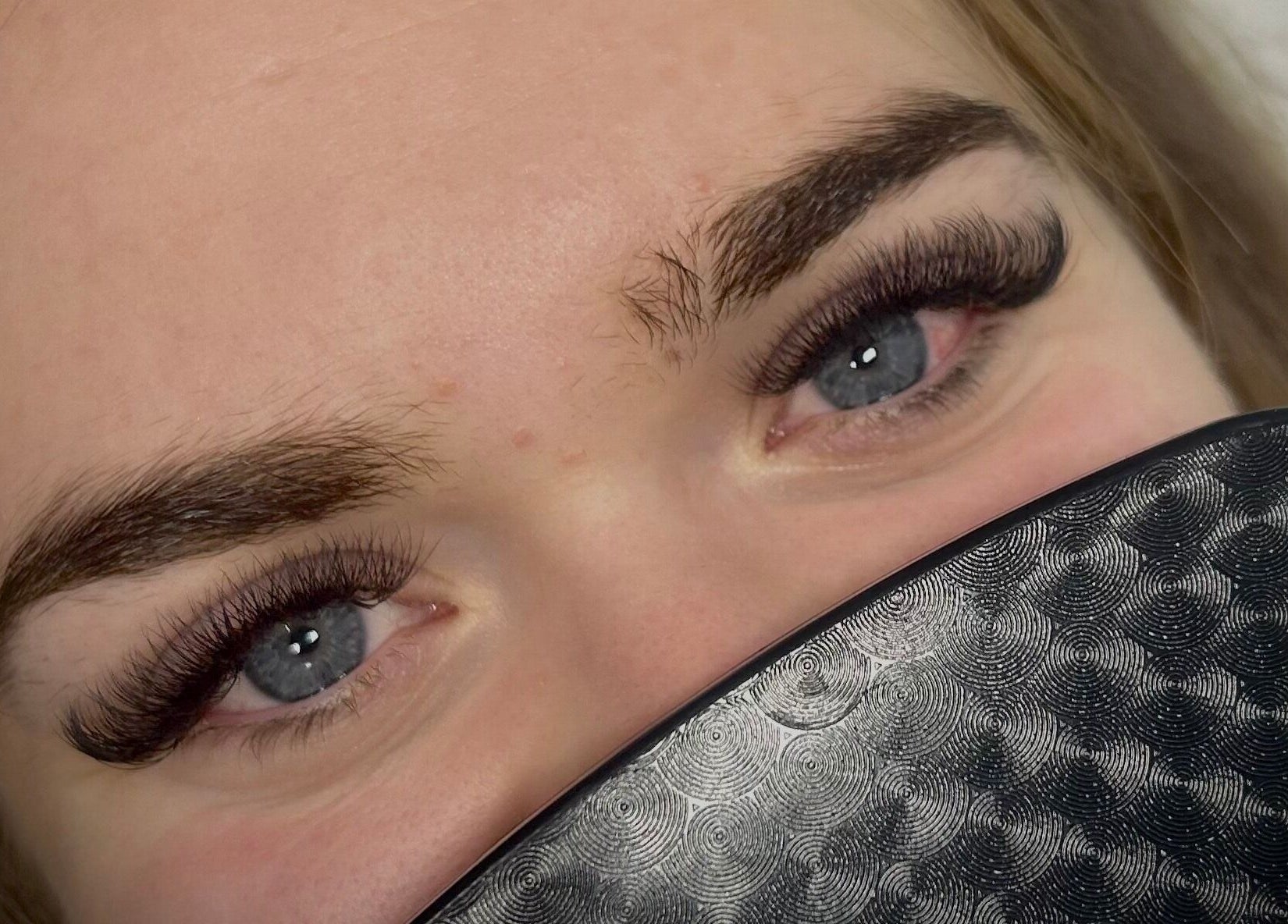 Close-up of enhanced eyelashes at Lash Euphoria, Inverness, Scotland, GB.
