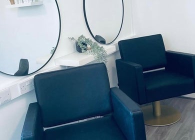 Elegant styling chairs and mirrors at Paije Love Hair, Rainhill, England, GB.