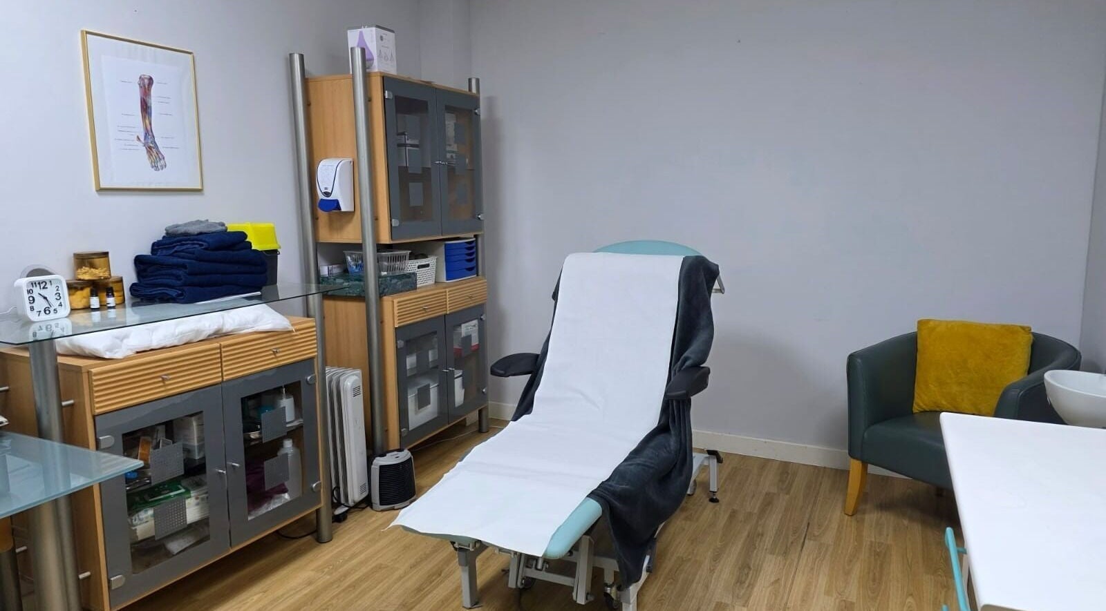 Cozy treatment room at All Being Well Health & Acupuncture in Ilkeston, England, GB. Relaxing and professional setting.