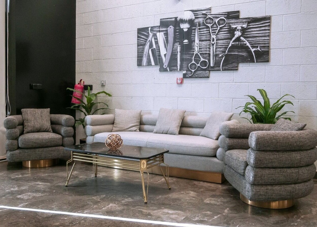 Stylish lounge area at Elegance Address EA, Riyadh featuring modern decor and plush seating.