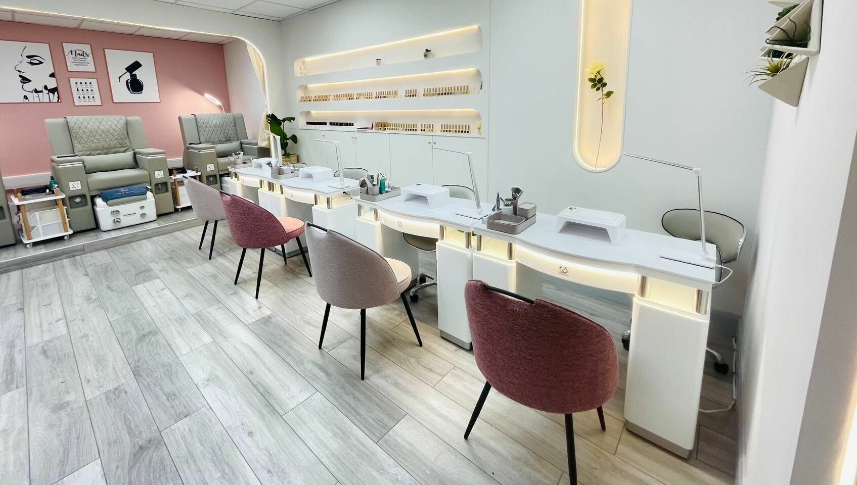 Modern nail salon interior at Truli Nails Beauty, Dublin, County Dublin, IE featuring plush chairs and chic decor.
