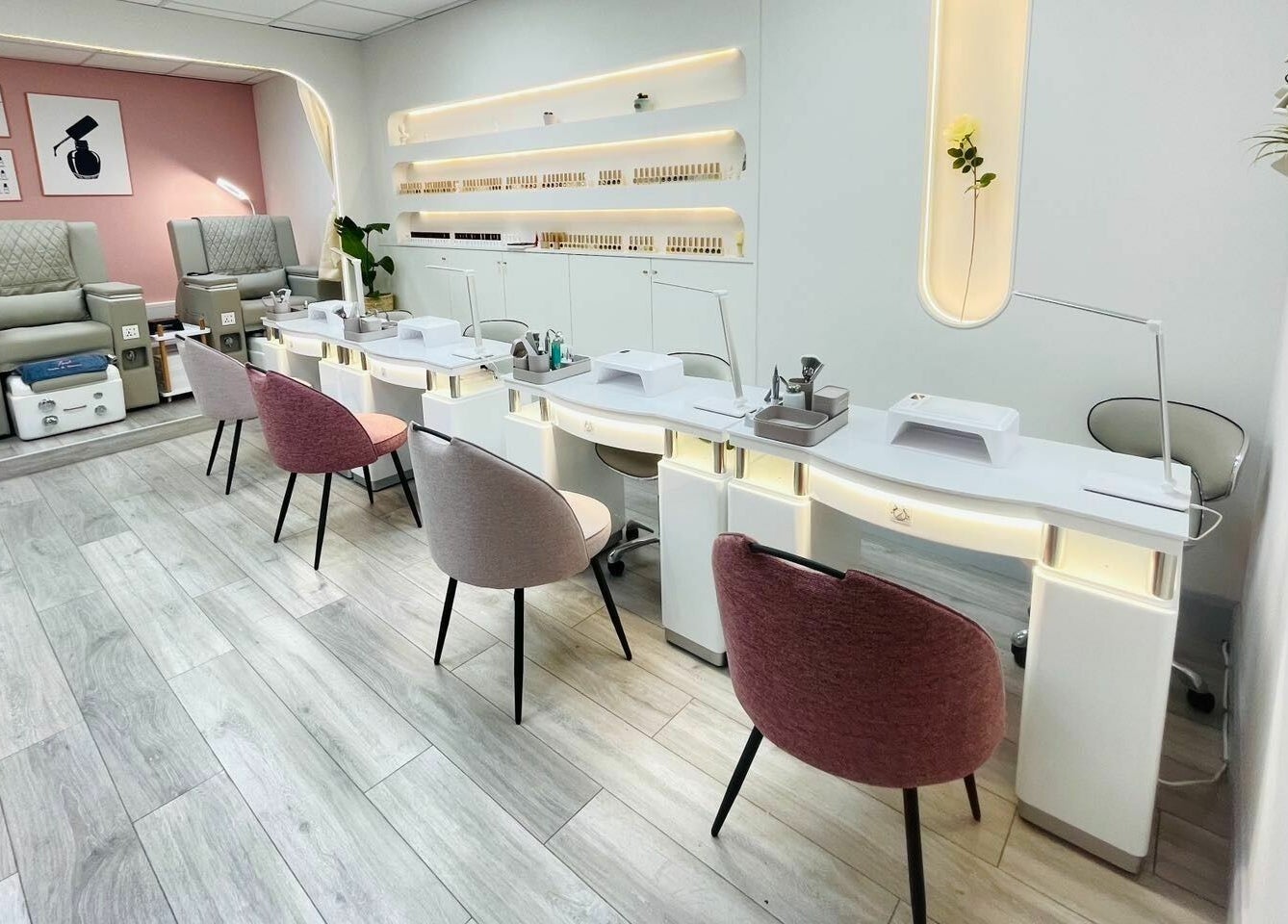Modern nail salon interior at Truli Nails Beauty, Dublin, County Dublin, IE featuring plush chairs and chic decor.