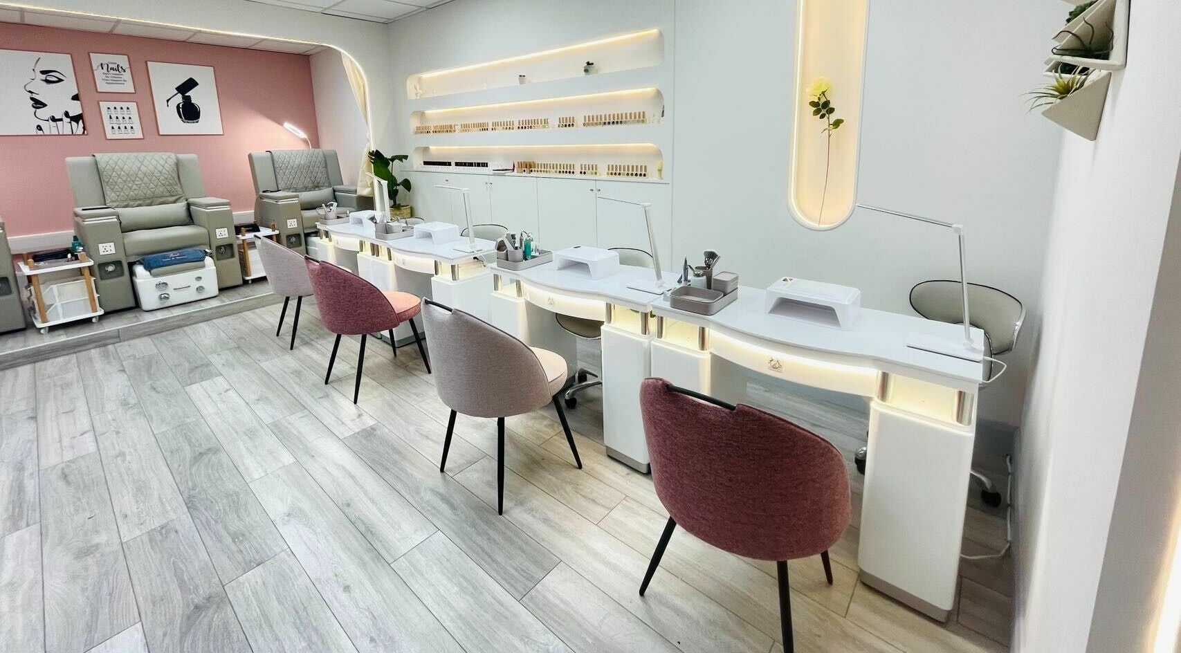 Modern nail salon interior at Truli Nails Beauty, Dublin, County Dublin, IE featuring plush chairs and chic decor.