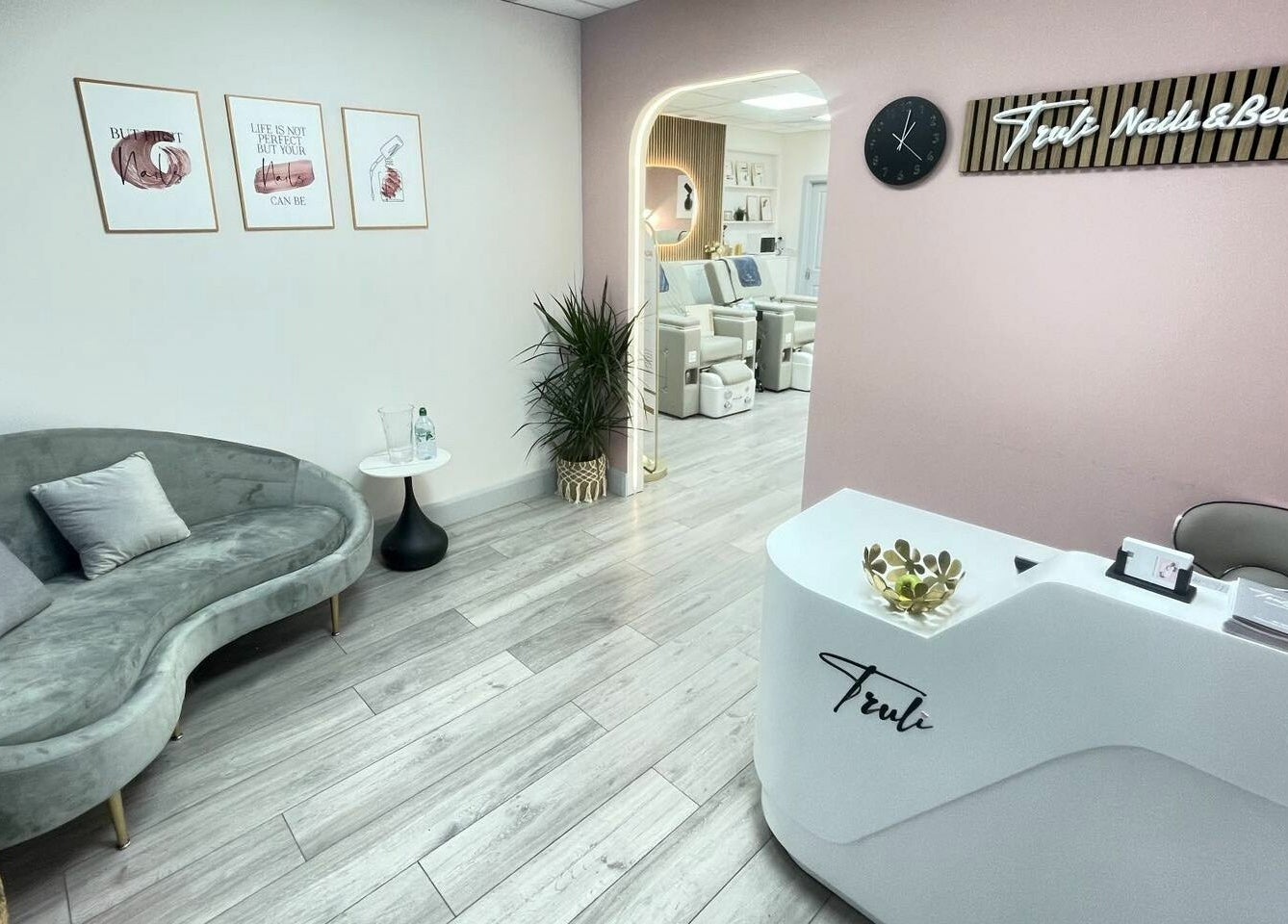 Elegant reception at Truli Nails Beauty, Dublin, County Dublin, IE, featuring modern decor and a cozy sofa.