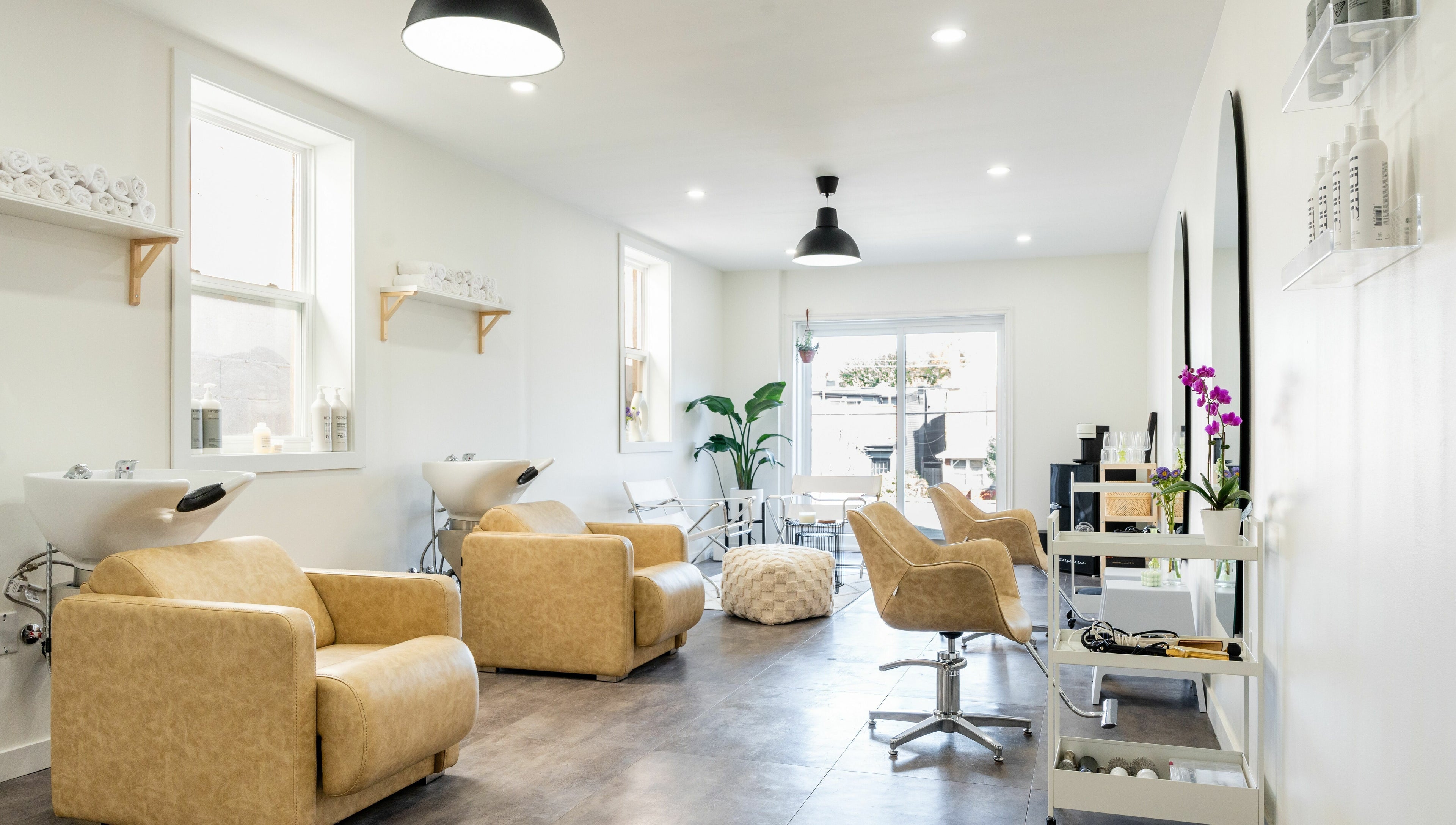 Elegant beauty salon interior at Bare Bones The Space in Toronto, Ontario, CA with modern furnishings.