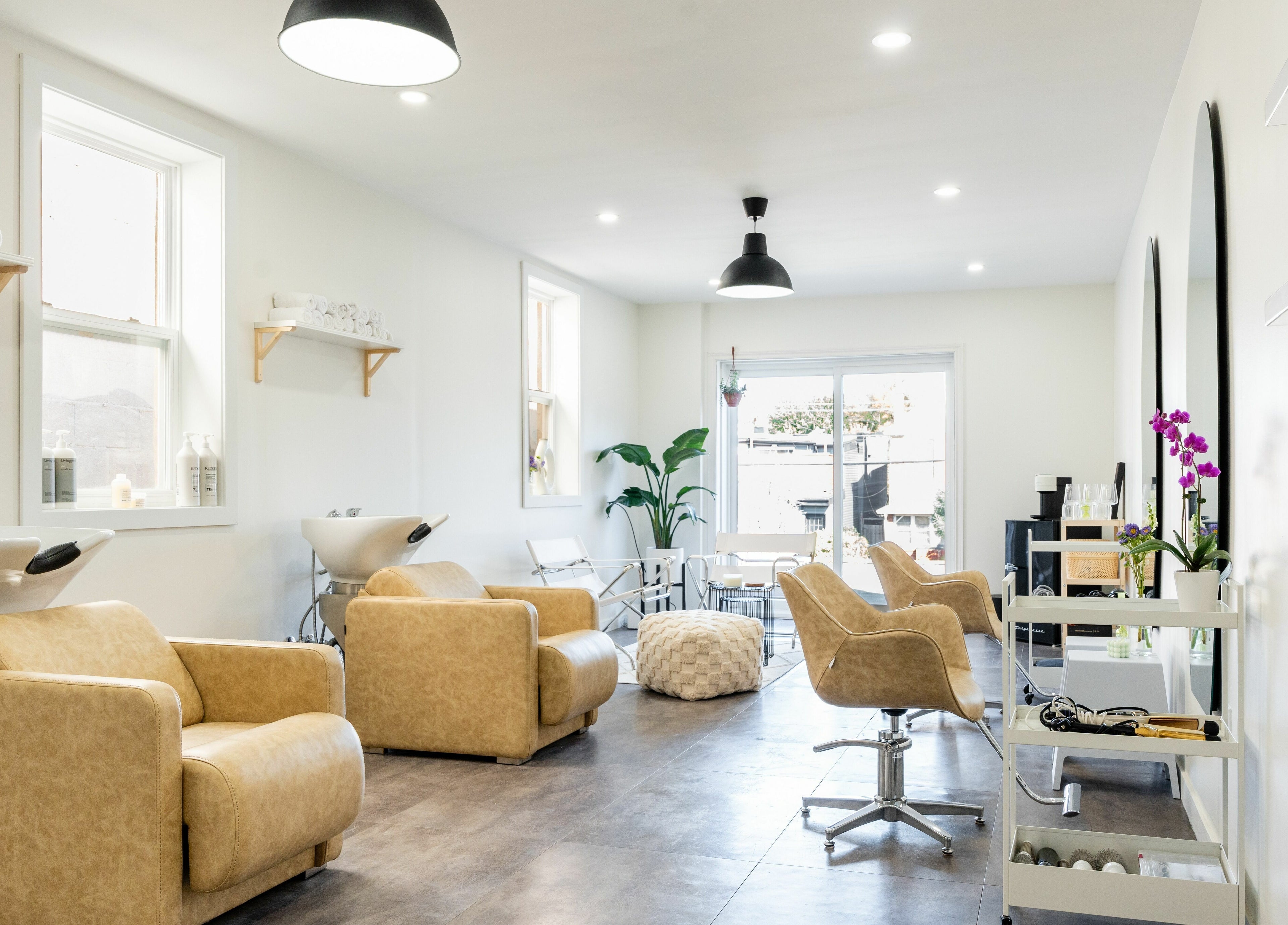 Elegant beauty salon interior at Bare Bones The Space in Toronto, Ontario, CA with modern furnishings.