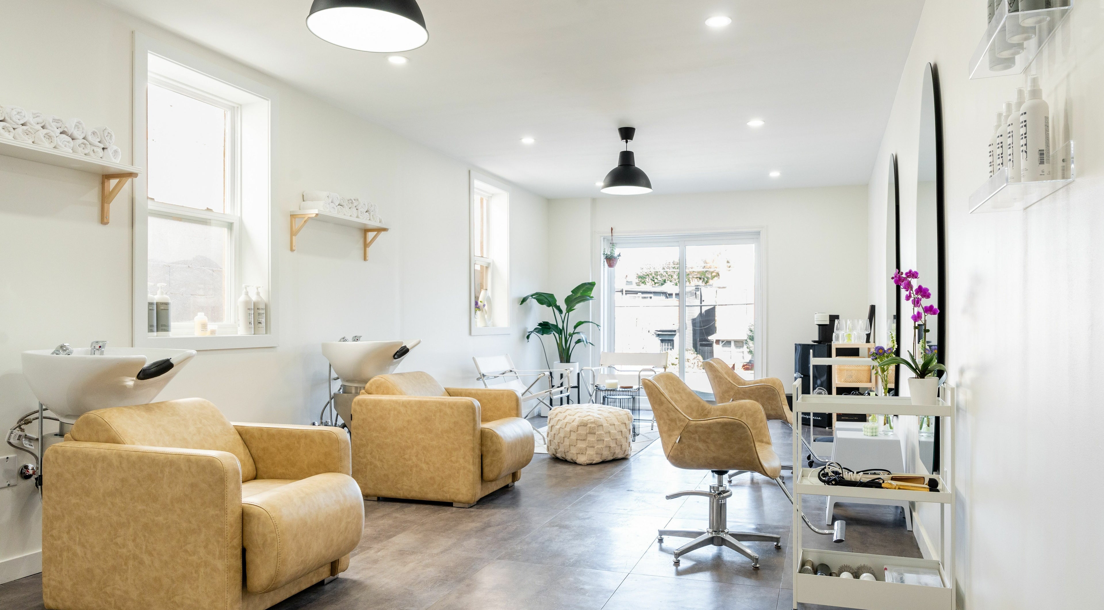 Elegant beauty salon interior at Bare Bones The Space in Toronto, Ontario, CA with modern furnishings.