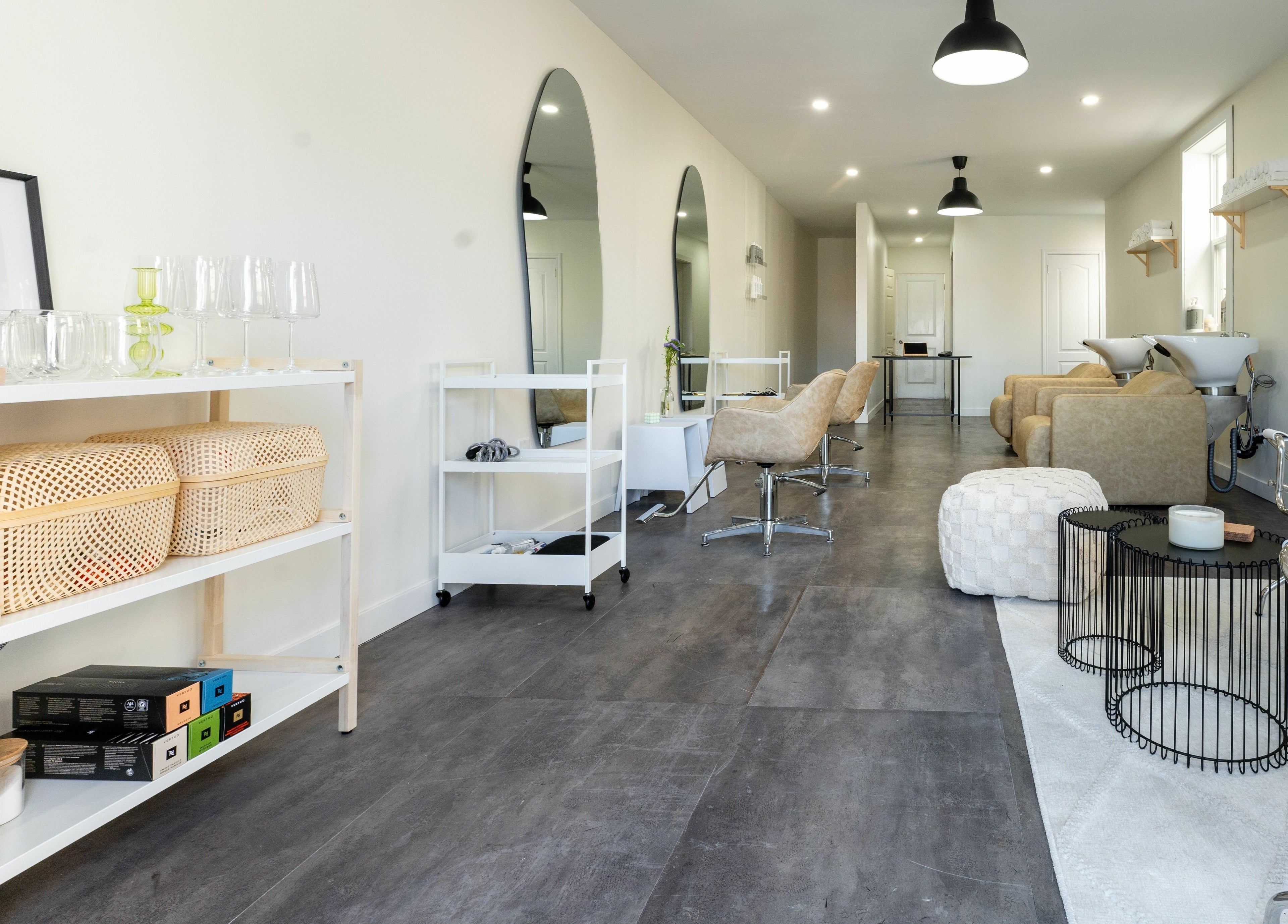 Elegant interior of Bare Bones The Space in Toronto, Ontario, CA, featuring sleek chairs and modern decor.