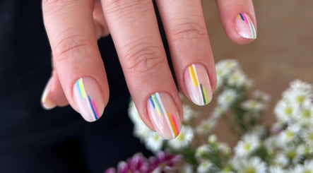 Colorful striped nail art at Russian Manicure. Awesome Nail Studio, New York, New York, US.