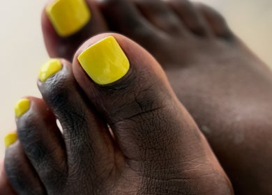 Bright yellow pedicure at Russian Manicure. Awesome Nail Studio, New York, New York, US.