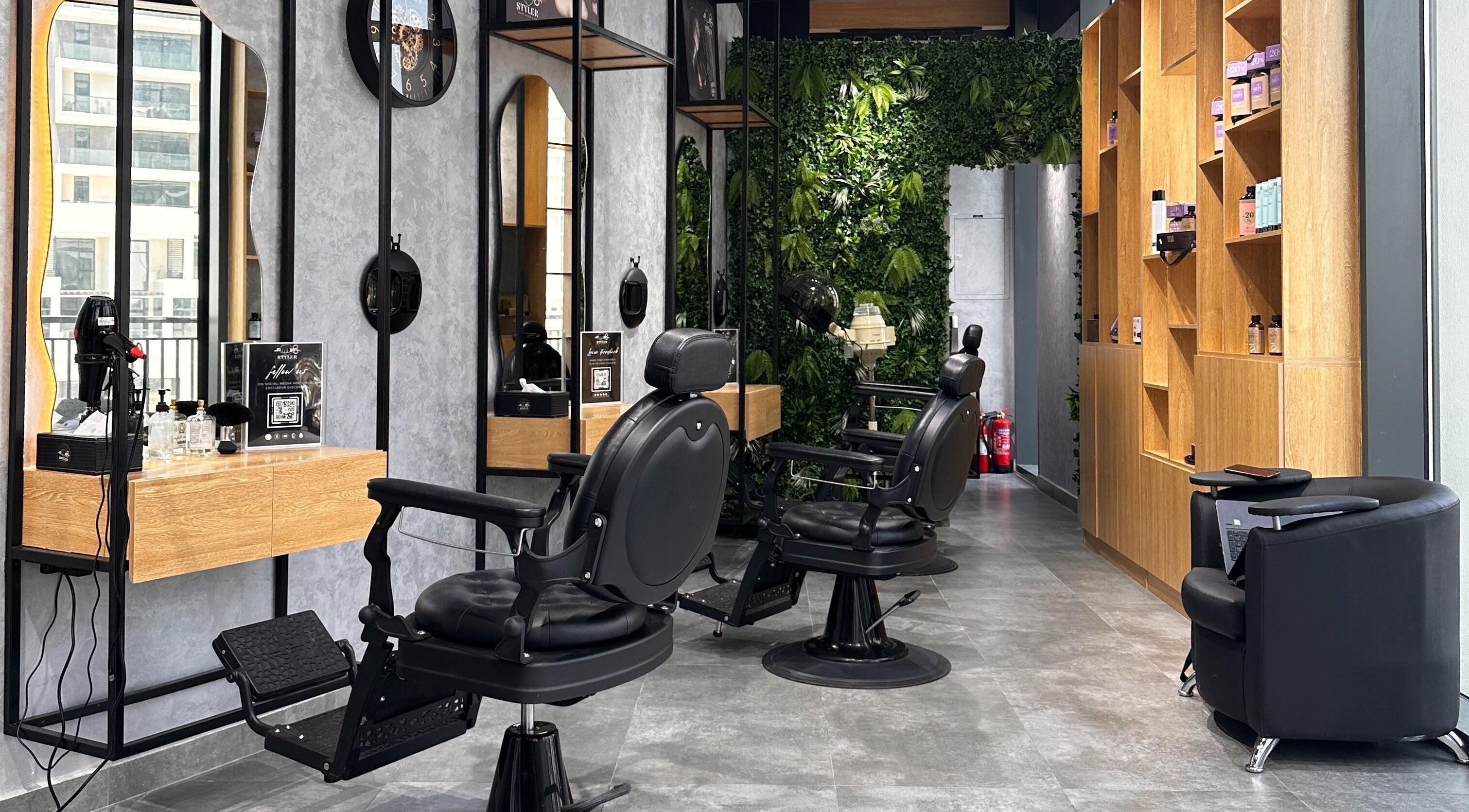 Modern salon chairs and decor at Styler Gents Salon & Spa - Al Raha City, Abu Dhabi, AE.