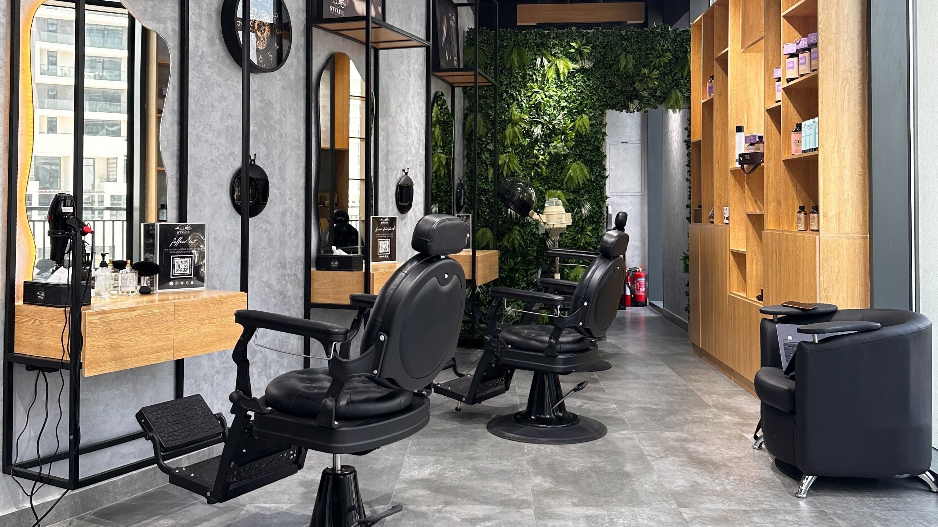 Modern salon chairs and decor at Styler Gents Salon & Spa - Al Raha City, Abu Dhabi, AE.