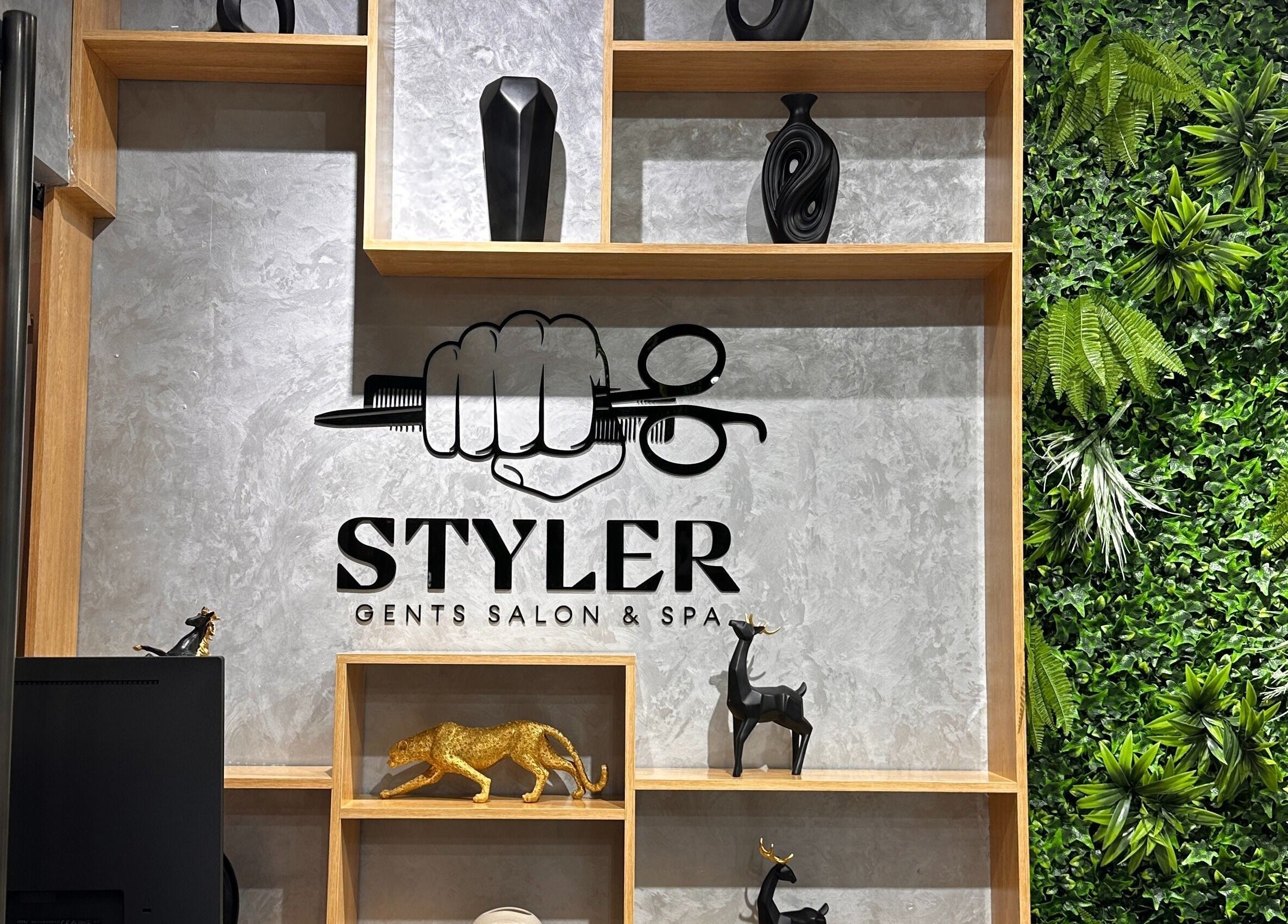 Modern wall decor at Styler Gents Salon and Spa - Rabdan Area, Abu Dhabi, AE.