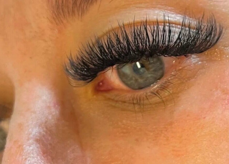 Close-up of eyelash extensions at Shoreline Spa in Langton, Ontario, CA, showcasing expertly applied lashes.