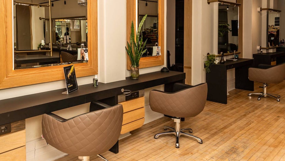 Modern hair salon at Excentric, Cape Town, Western Cape, ZA with sleek styling stations and comfortable chairs.