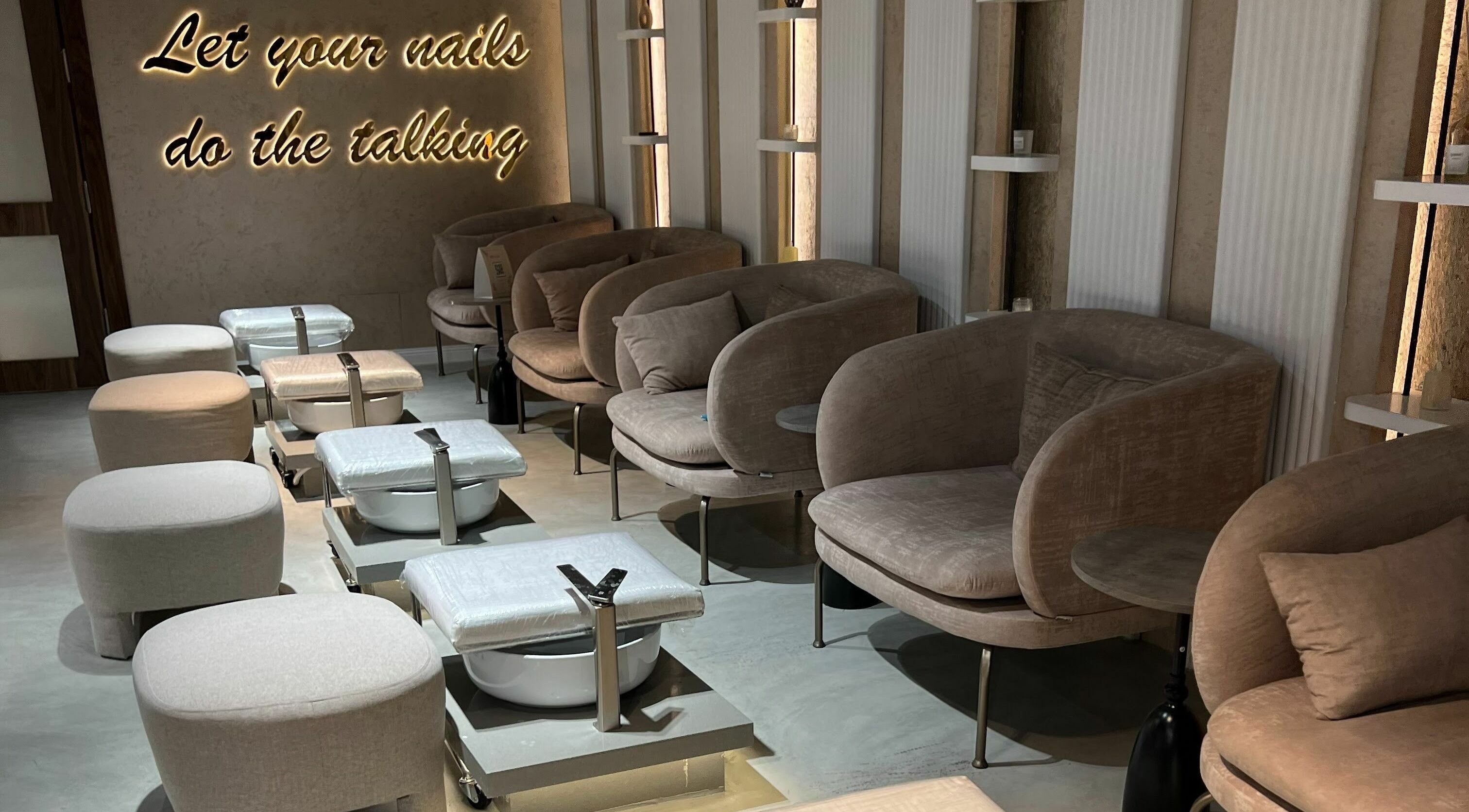Luxurious nail lounge at Rawan Professional, Riyadh, Riyadh Province, SA, showcasing plush seating.