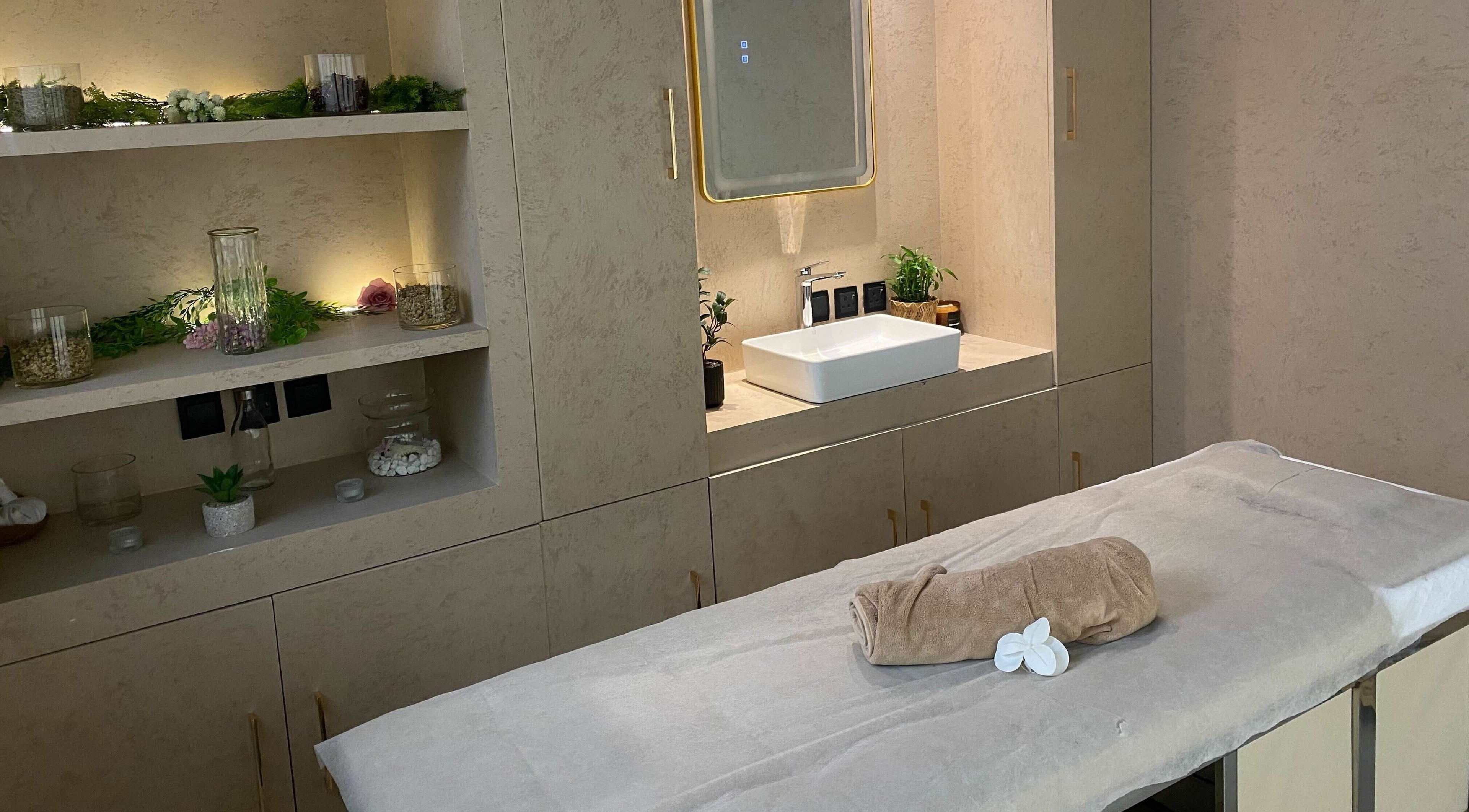 Elegant treatment room at Rawan Professional, Riyadh, Riyadh Province, SA, featuring a plush massage bed.
