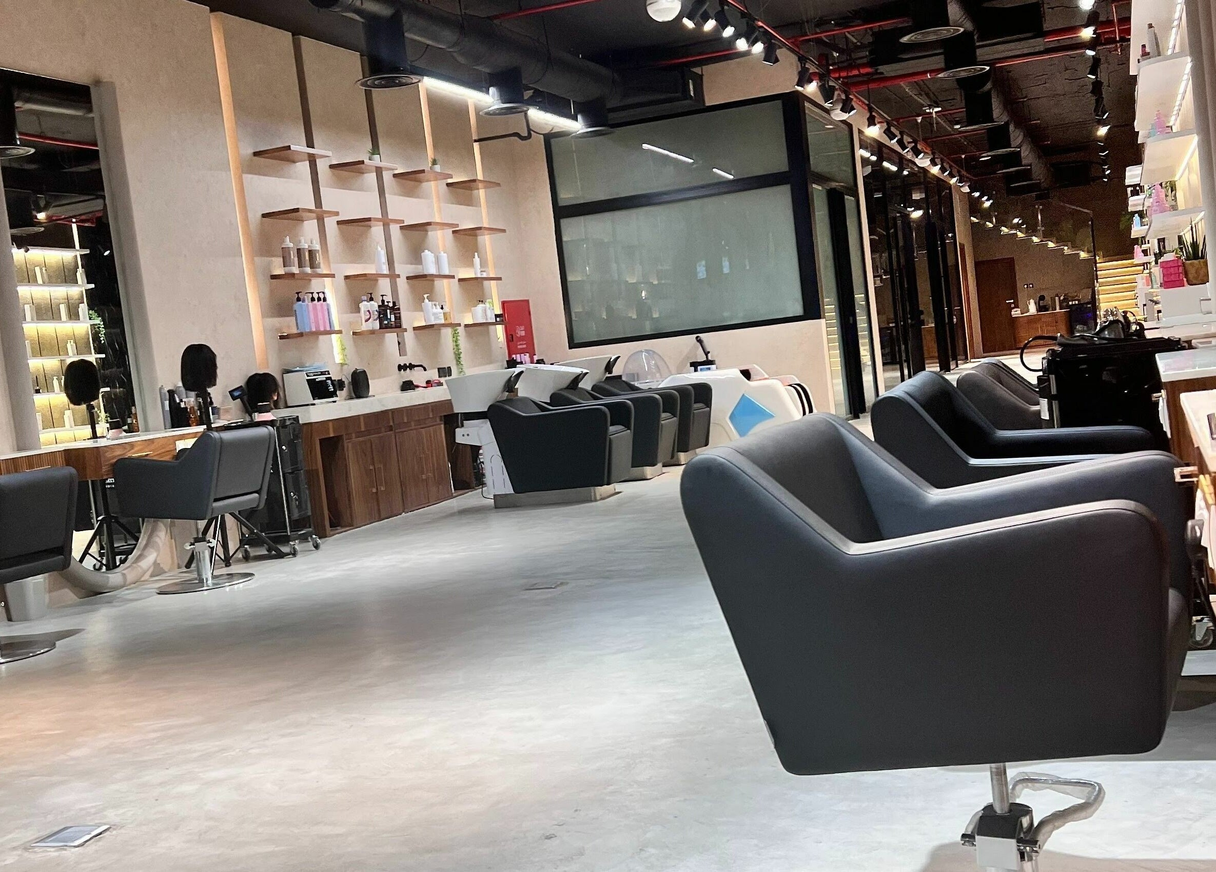 Modern salon interior at Rawan Professional in Riyadh, Riyadh Province, SA with sleek styling chairs and decor.