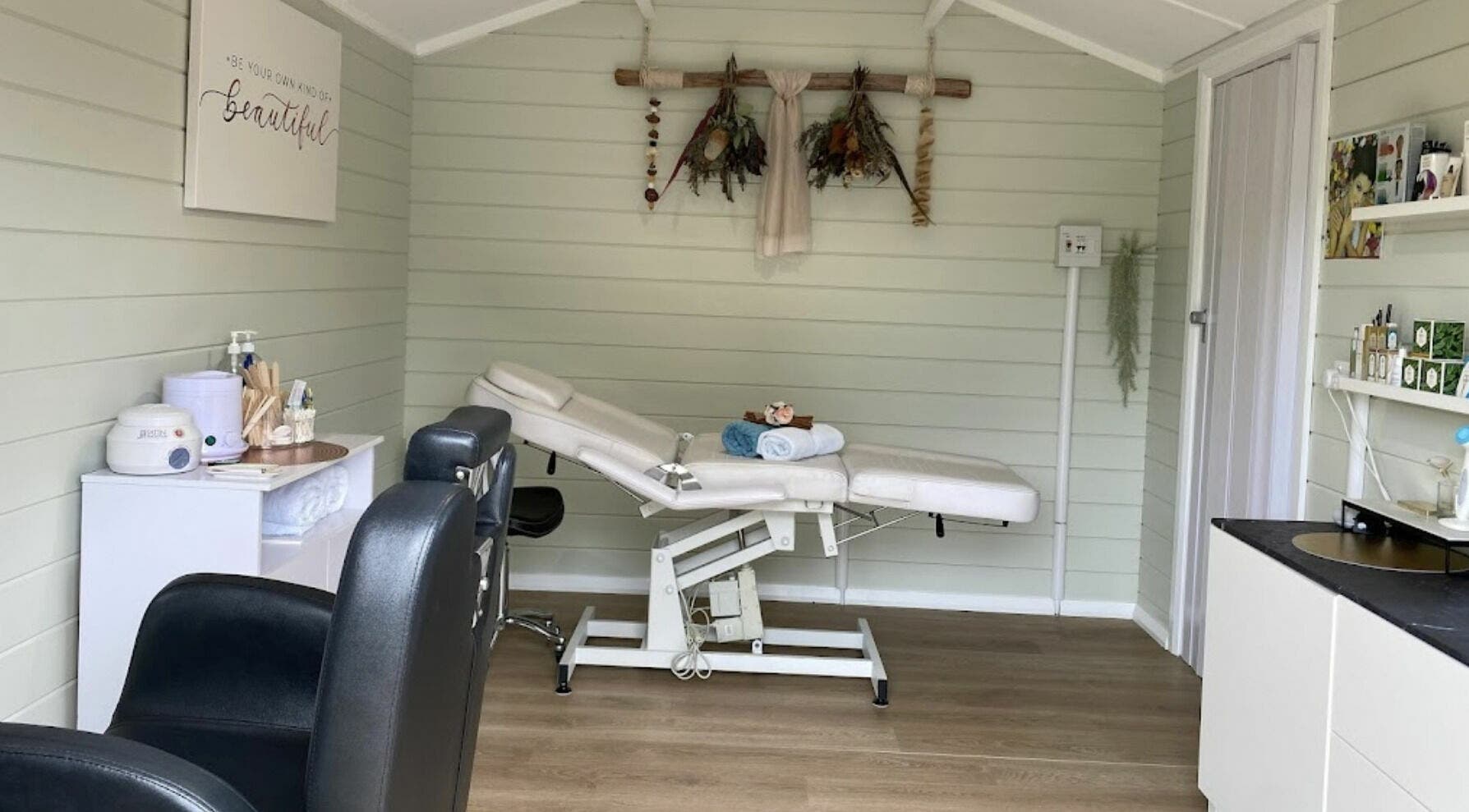 Relaxing treatment room at Nuray's Beauty in Umina Beach, New South Wales, AU. Cozy and serene decor.
