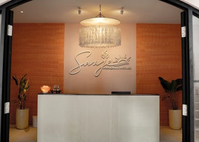 Reception area of Sanje Wellness Gading Serpong located in Banten, Banten, ID, showcasing a chic interior design.