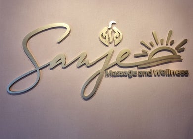 Elegant logo of Sanje Wellness Gading Serpong, Banten, Banten, ID on textured wall.
