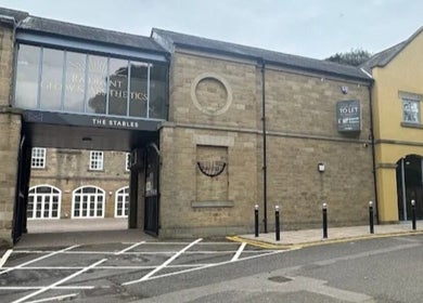 The exterior of Elevate Therapies in Doncaster, England, GB showcasing a historic stone building.