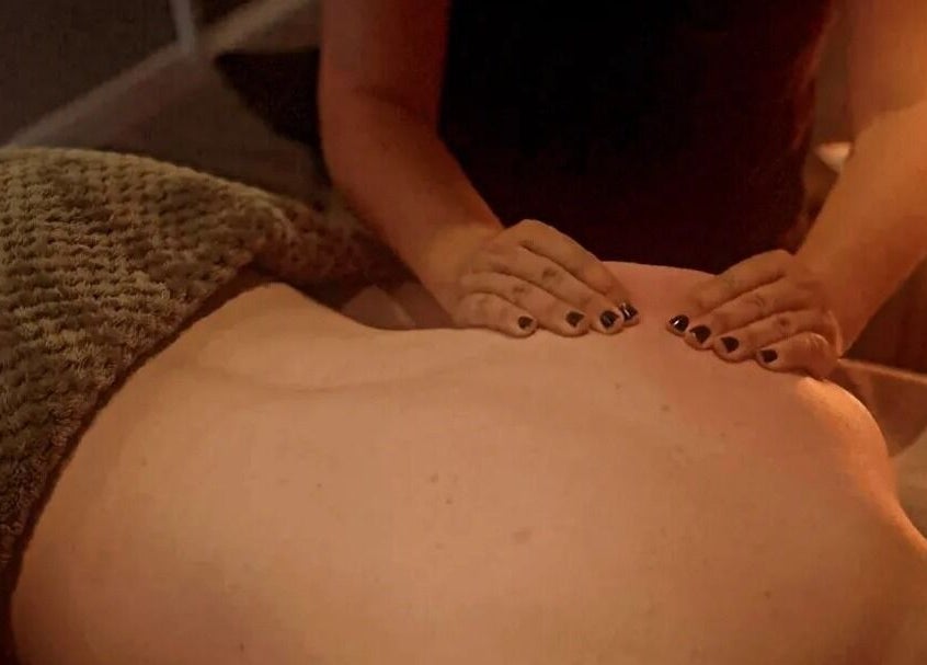 Relaxing massage session at Elevate Therapies, Doncaster, England, GB, highlighting therapeutic care.