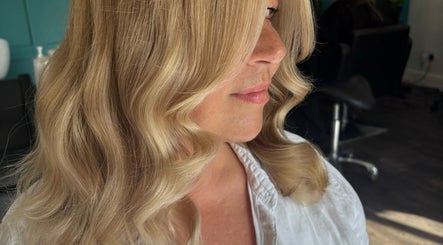 Elegant blonde waves styled at Hair by Liv in Stamford, England, GB.