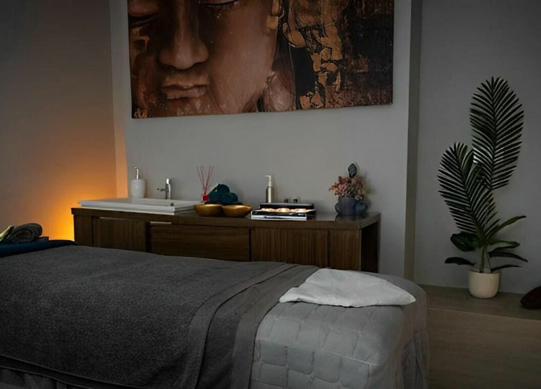 Relaxing massage room at Oasis Spa Therapy in WORTHING, England, GB, with ambient lighting and decor.