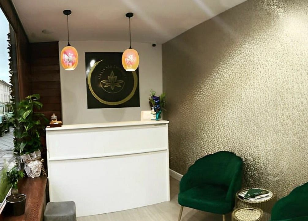 Elegant reception at Oasis Spa Therapy, WORTHING, England, GB, featuring chic decor and modern seating.