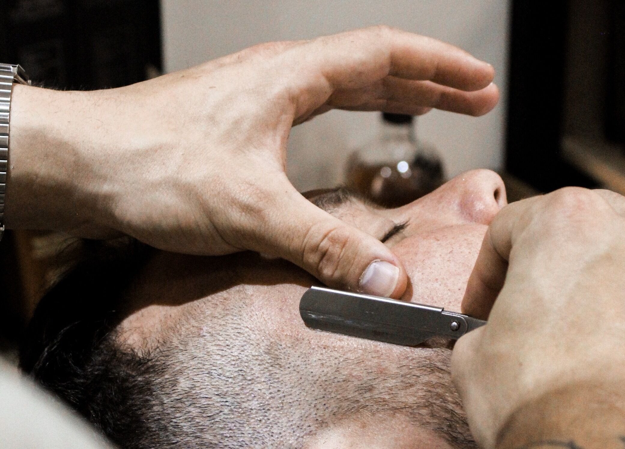 Close-up of a precise shave at The Barber in Bloemfontein, Free State, ZA, showcasing expert grooming.